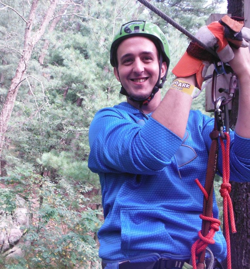 Andrew Sutcliffe outdoors on a rope course